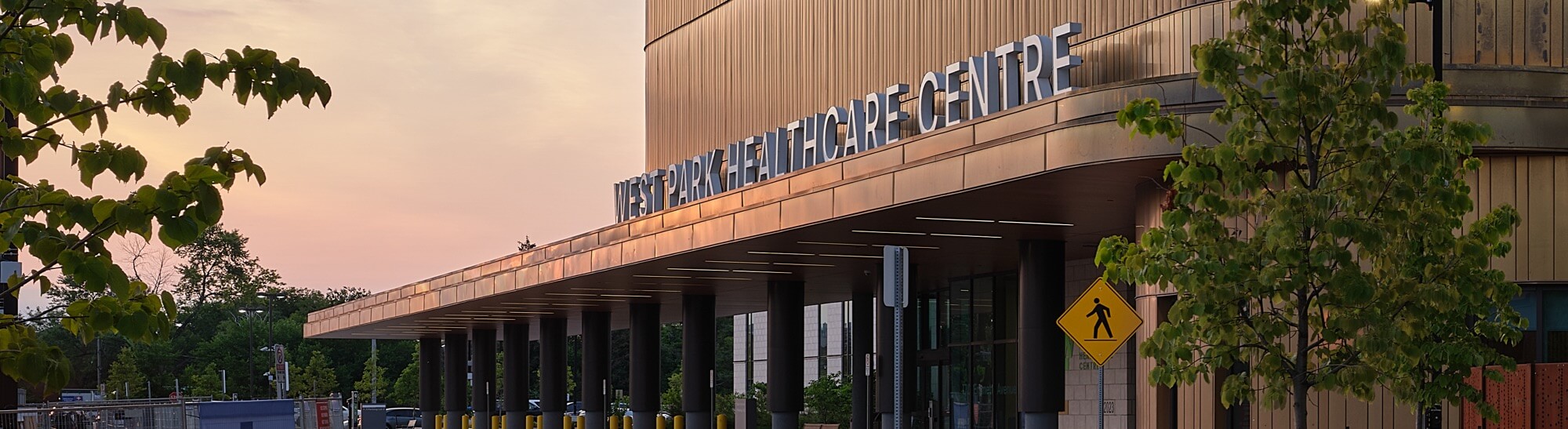 Close-up of the name West Park Healthcare Centre at the building entrance